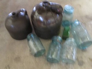 Stoneware crock jugs and blue tone ...