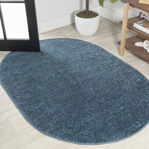 JONATHAN Y Haze Solid Low-Pile Turquoise 4 ft. x 6 ft. Oval Area Rug