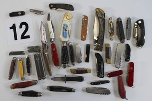 Lot of Folding Knives And Buck Knives