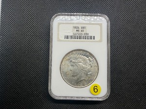1924 Silver Peace Dollar - NGC MS65 - NGC Price Guide Value for an MS62 is $220