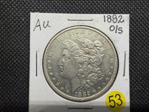 1882 OS Silver Morgan Dollar Marked AU when Purchased - Greysheet Wholesale Value for an AU50 is $107