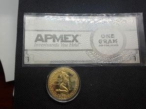 Marilyn Monroe Medallion and 1 Gram Silver APMEX Sheet