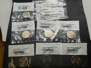 Seven State Quarters Uncircluated-60 and 2003 P&D Kennedy Half Dollar Uncirculated-60 in Littleton Packaging