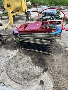 Stack of Metal Folding Chairs