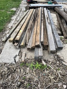 Lot of Weathered Dimensional Lumber and Timber Posts Including 4x4 and Larger Sections Approximately 8 in Length