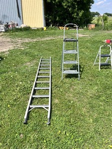 Lot of Ladders Including 10-Foot Extension Ladder Section and a Step Ladder