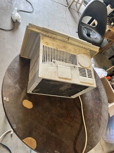 GE Window Air Conditioner Unit approximately 16 inches wide by 13 inches tall with manual rotary Temp and Mode controls - Works