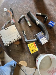 JVC KD-G210 CD Receiver with Wiring Harness, Gates 22793 Upper Radiator Hose, Gates 87730 Bypass Hose, Gates 18796 Heater Hose, Gates 18937 Molded Coolant Hose, Murray Plus 3779 Thermostat, Stant Radiator Cap and Perfect Stop PC1088 Ceramic Brake Pads