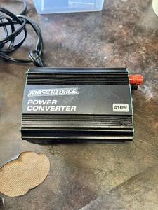 Masterforce 410W Power Converter and Deltran Battery Tender Junior Automatic Battery Charger with Accessories in Storage Bin