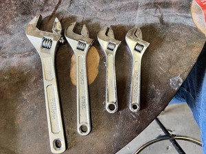 Lot of 4 Adjustable Wrenches Including Hyper Tough 10 Inch, Forged Steel, China, and Drop Forged Models
