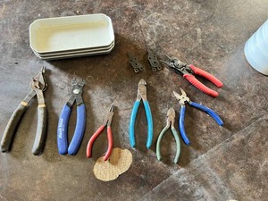 Set of Hand Tools Including Pliers, Cutters, and Snap Ring Pliers