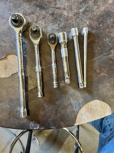 Ratchet Set including 12 Drive, 38 Drive and 14 Drive Ratchets with Extension Bars