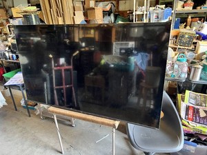 TCL Flat Screen TV with HDMI and AV Inputs 56 12 Wide - Lights Up in Back, Needs Remote