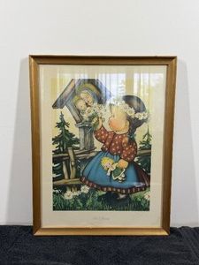 vintage The Offering lithograph print by Herbert Dubler depicts a young girl in traditional alpine attire offering daisies to a shrine of the Virgin Mary.