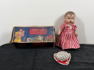 vintage Sweetums drink-and-wet composition baby doll manufactured by the Effanbee Doll Company, dating back to the 1930s or 1940s.
