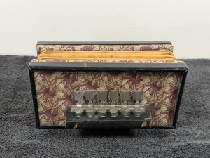 Vintage childs toy squeeze box accordion.