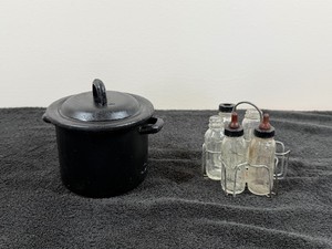 vintage baby bottle sterilizer rack filled with miniature Evenflo glass toy baby bottles & Sterilizer Pot