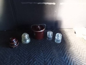 Insulators and a crock jar