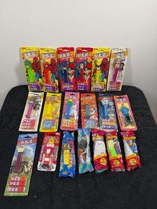 Large Lot of Collectible PEZ Dispensers in Original Packages - Darth Vader - Hulk - Bratz - Fozzie Bear -.Batman - Wolverine - Garfield and More