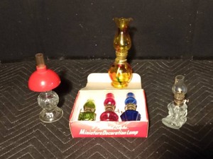 6 small oil lamps