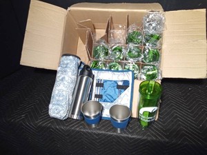 Box of new no spill drinking glasses and a thermos warming pack with cups and utensils