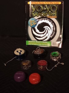 Lot of Pro yo-yos and Yo-yo World magazine