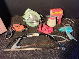 Wooden box of hand tools and power tools and vise