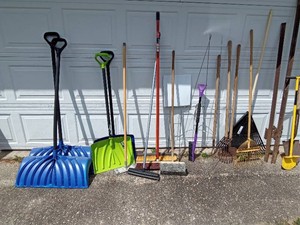 Shovels, brooms, apple picker, fence stakes, rakes and more