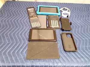 Electronic Tablets, calculators, Fitbit, tablet case and more