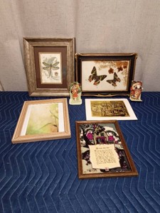 Vintage greeting cards and framed butterflies and prints