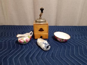 Coffee grinder, creamersugar and pottery shoe