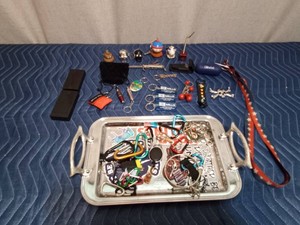 Tray of key rings, knife with sheath, magnet hide a key boxes and more