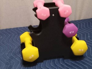 2,3,&5lb weights on a rack