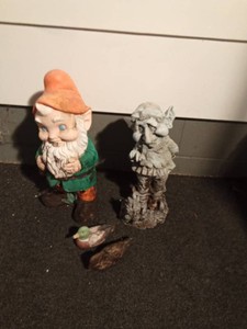 Cement and ceramic gnomes and ceramic & wooden ducks