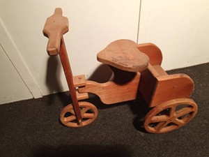 Wooden doll tricycle