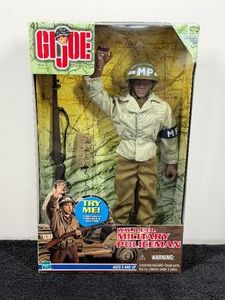 G.I. Joe WWII E.T.O. Military Policeman 12-inch action figure. Released by Hasbro in 1999, this collectible figure features an interactive Try Me talking function that triggers up to 11 different military phrases when the arms are raised or lowered.