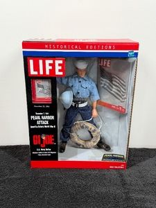 G.I. Joe LIFE Historical Editions Pearl Harbor Attack U.S. Navy Sailor action figure. Released by Hasbro in 2000, this 12-inch collectible commemorates the December 7, 1941 attack on Pearl Harbor.