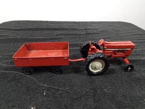 International toy tractor with trailer attached
