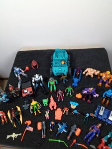 GI Joe jeep, transformer and several figures and accessories