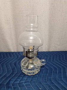 Vintage oil lamp with a Hurricane chimney and a finger loop