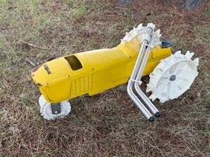Nelson RainTrain Traveling Sprinkler. This self-propelled, cast-iron lawn sprinkler uses internal water pressure to slowly drive itself along the path of your garden hose.