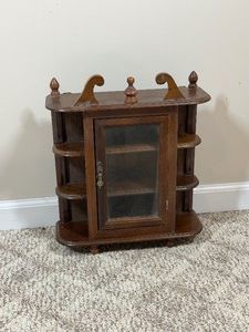 Vintage Victorian-style wooden mini curio cabinet designed for displaying trinkets, miniatures, and small collectibles.