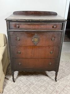 vintage or antique four-drawer chest of drawers, most likely dating back to the 1920s or 1930s. - BRING HELP TO LOAD