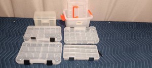 5 tackle boxes and a container