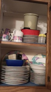 All contents of 2 cupboards (bring boxes and must take all)