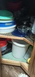 Contents of corner cupboard (bring boxes and must take all)