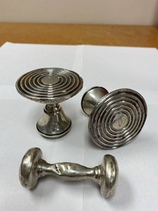 Lot Including 2 Sterling Weighted Candle Holders & Silver Baby Rattle