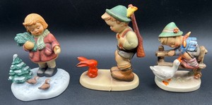 Goebel Hummel Figurines - Barnyard Hero  1948, Seeds of Friendship Berta Hummel Goebel 2000 and Sensitive Hunter Model 60