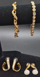 Two Sets of Swarovski Bracelets and Earrings with Swan Logo
