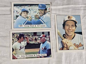Lot of 3 Vintage SSPC Baseball Cards Featuring Brooks Robinson, George Brett, Al Cowens, Jerry Koosman, and Duke Snider.